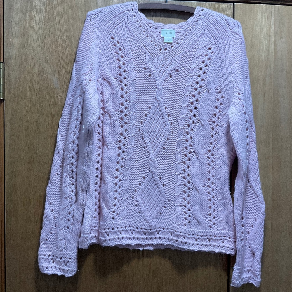 Knitted pink sweater